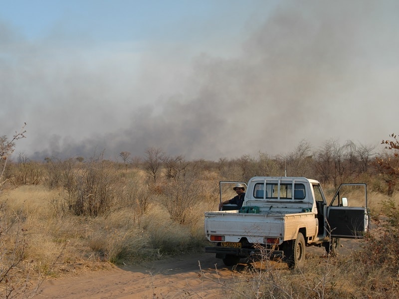 Pickup with Bushfire in Background