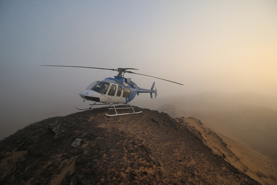 Helicopter on Rock Outcrop